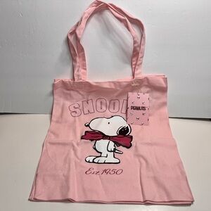 NWT Snoopy Cotton Canvas Tote Bag
Pastel pink cotton tote with Snoopy print